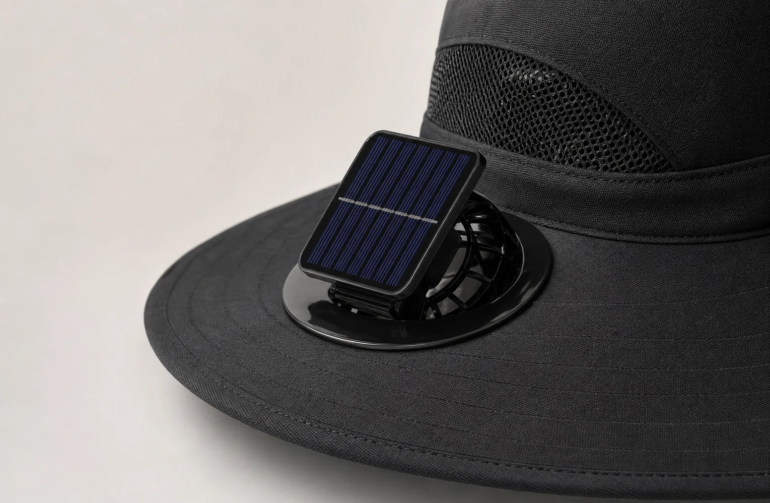 Close-up of the Solar-Breeze solar fan detail on the black hat